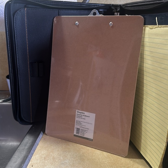 Allan’s  portfolio with calculator also with Staples clipboard unopened - Picture 5 of 9